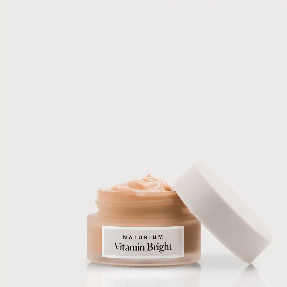 vitamin-bright-illuminating-eye-cream-m4 NATR-VitaminBright_DEEP_Primary_front_openjar_bone.webp