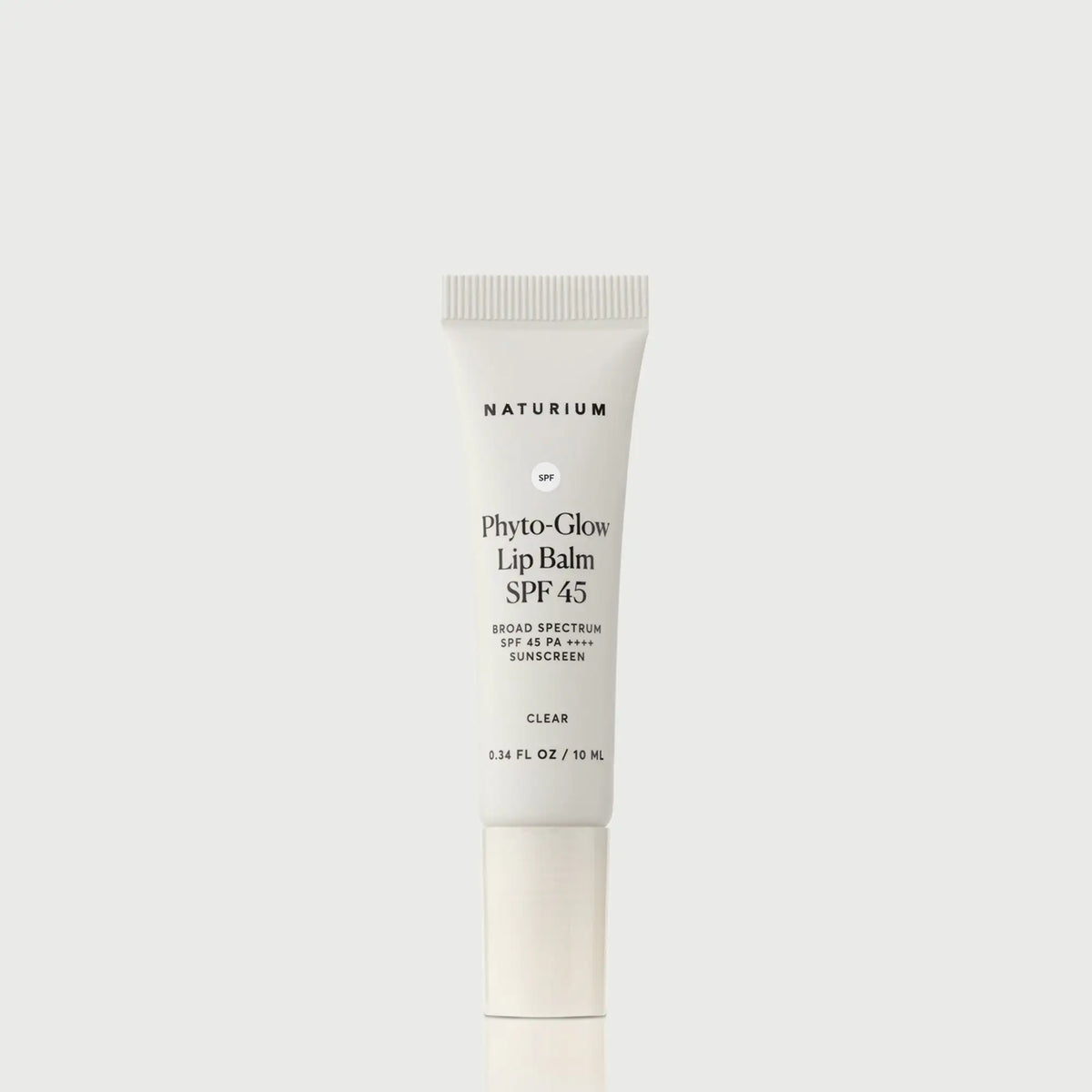 phyto-glow-lip-balm-spf-45-clear-k1 NATR-10124_PhytoGlow_SPF_Clear_primary_capon_front_bonebkgd_1.webp