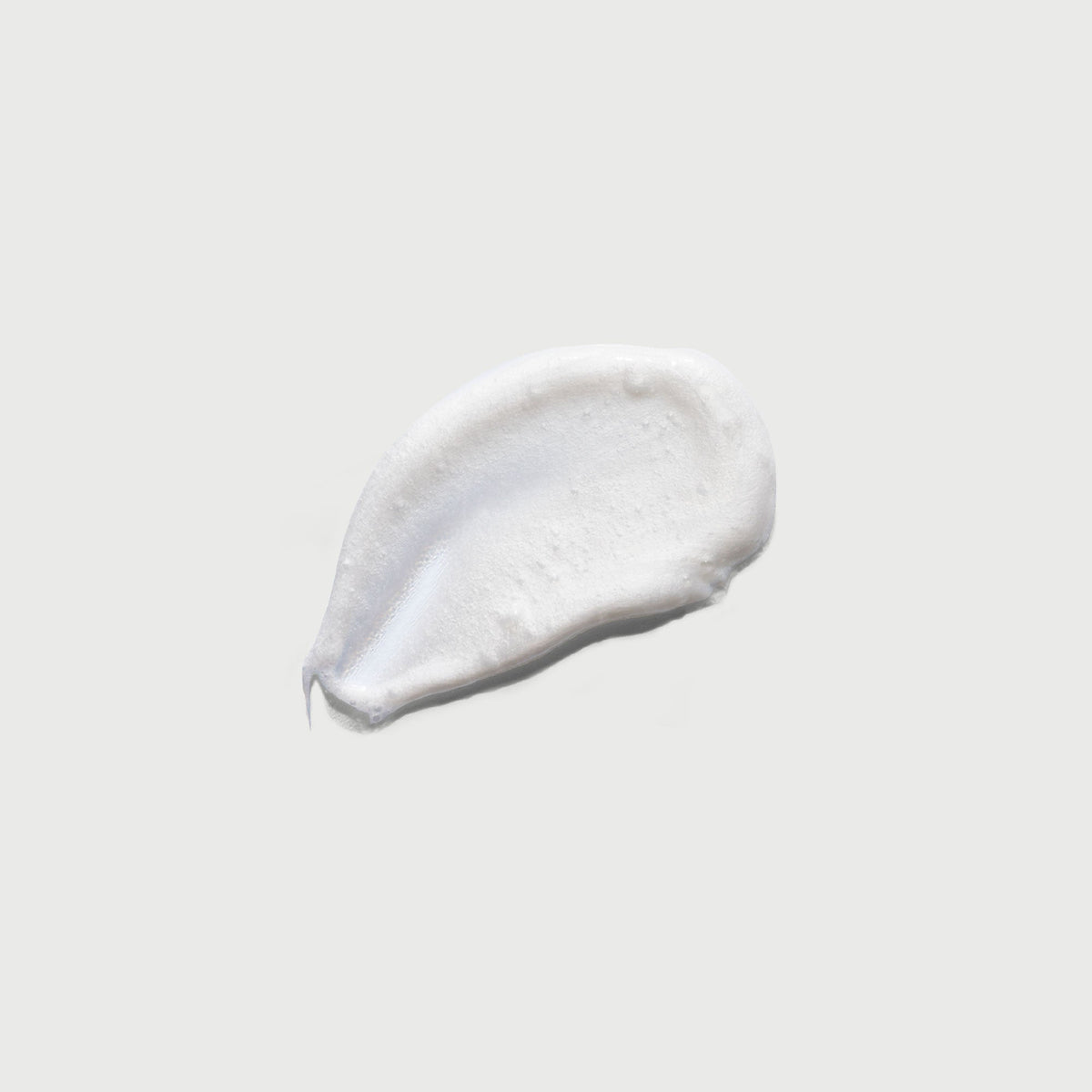 the-smoother-glycolic-acid-exfoliating-body-wash-d1 NATR-40002-Swatch-The-Smoother-Glycolic-Acid-Exfoliating-Body-Wash-bonebkgd.jpg