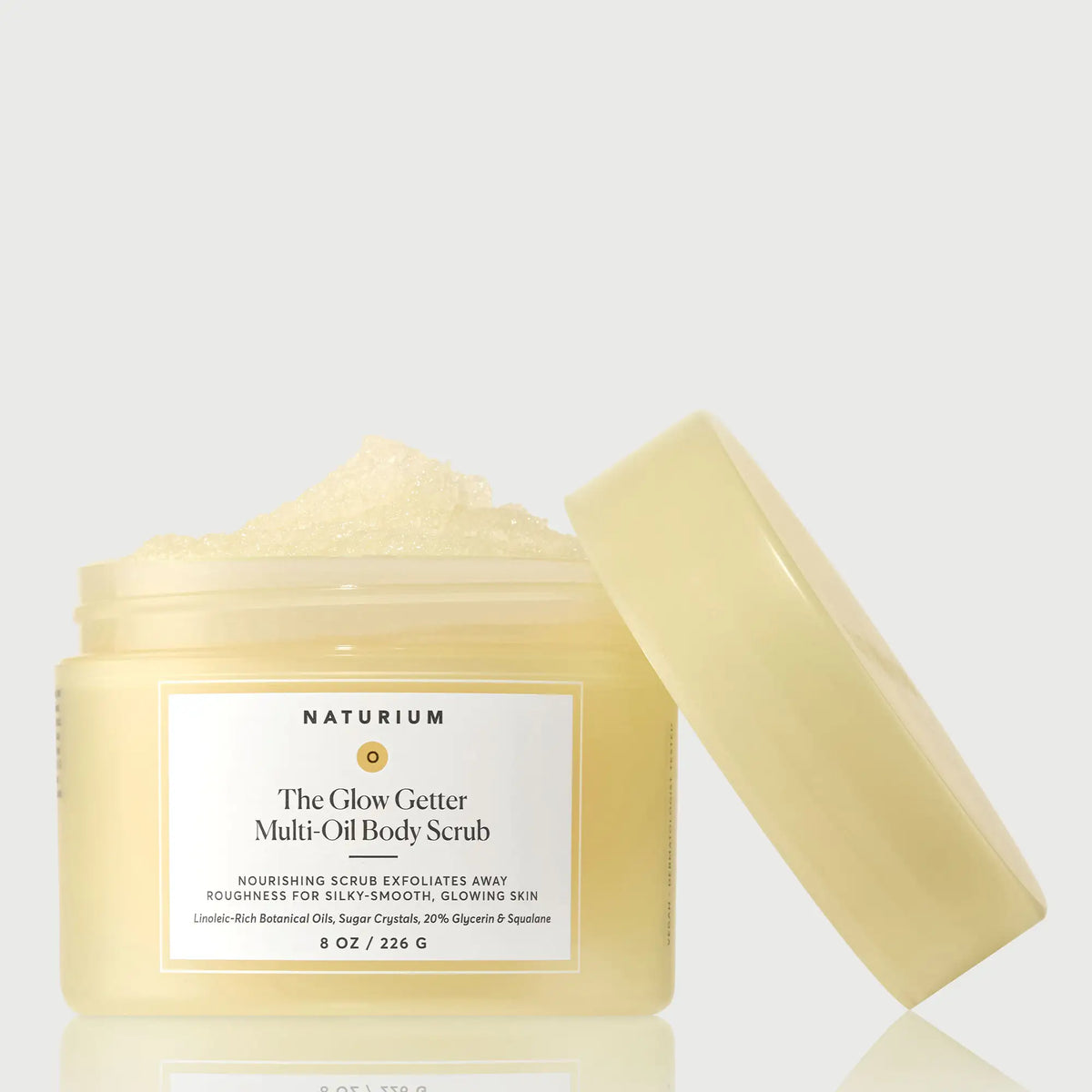 the-glow-getter-multi-oil-body-scrub-z4 NATR-40028-GlowGetter-Multi-Oil-Body-Scrub-Front-CapOff-bonebkgd.webp