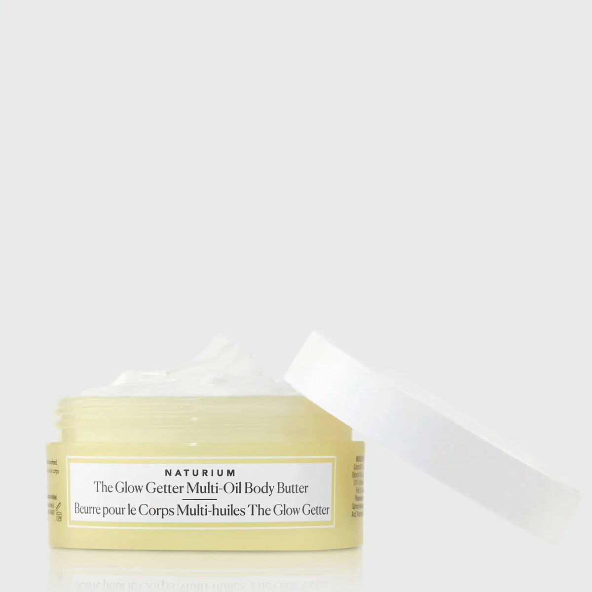 the-glow-getter-multi-oil-body-butter-travel-size-d3 NATR-40115_Glow-Getter-Body-Butter-Mini_front_capoff_bonebkgd.webp